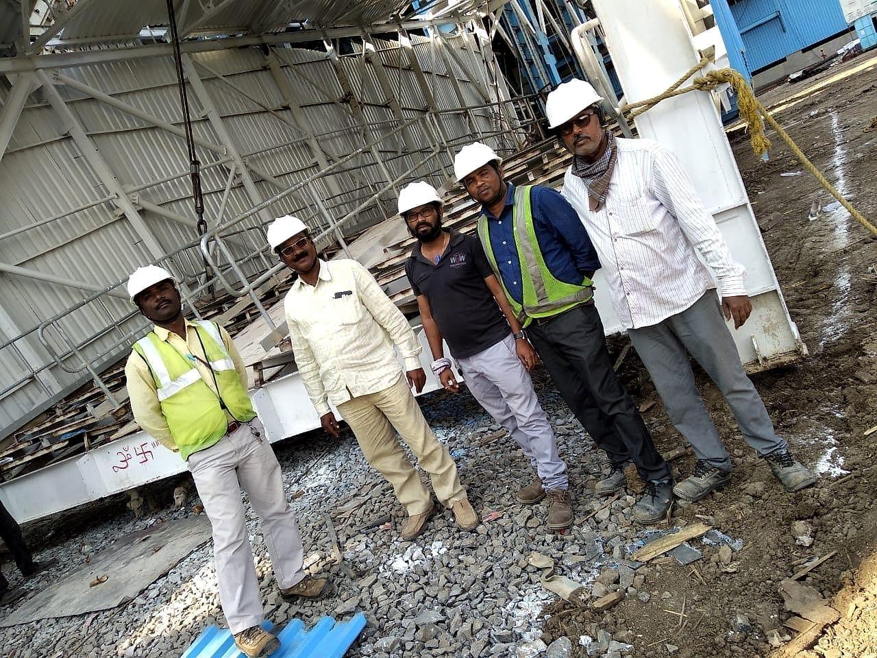 KVK engineers and supervisors on site beside a fabricated steel assembly at NTPC Solapur